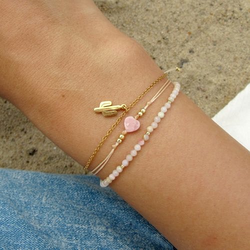 komplet zlotych bransoletek z kamieniami